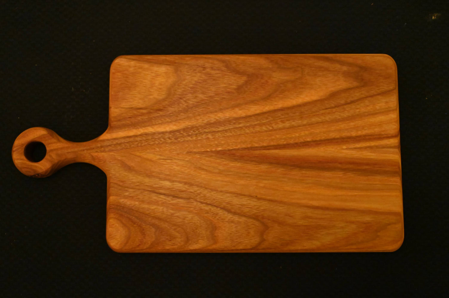 Rounded Handle Canary Wood Charcuterie Board