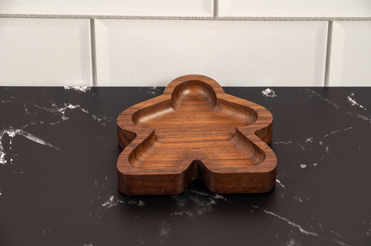 Hardwood Meeple shaped gaming component trays